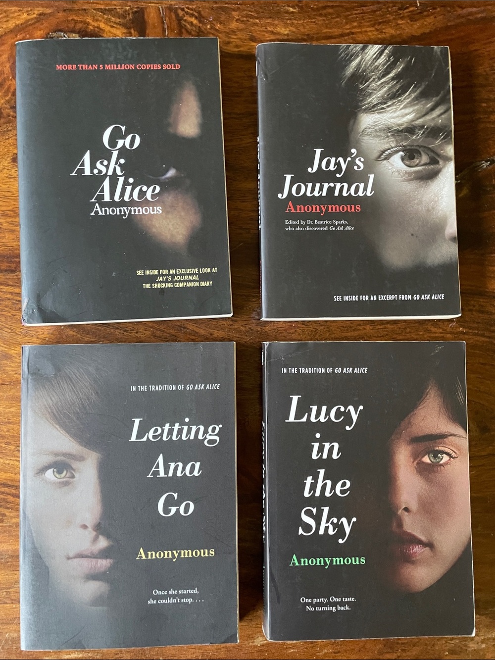 Set of 4 Anonymous Used Paperbacks with Black Covers: Alice Jay Ana Lucy